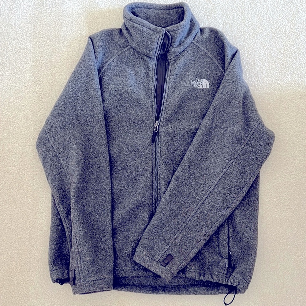 Mens size larg north face fleece zip up jacket. Color: gray.